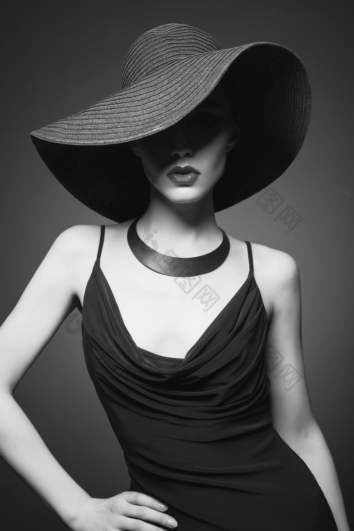 戴帽子的时尚女人摄影图