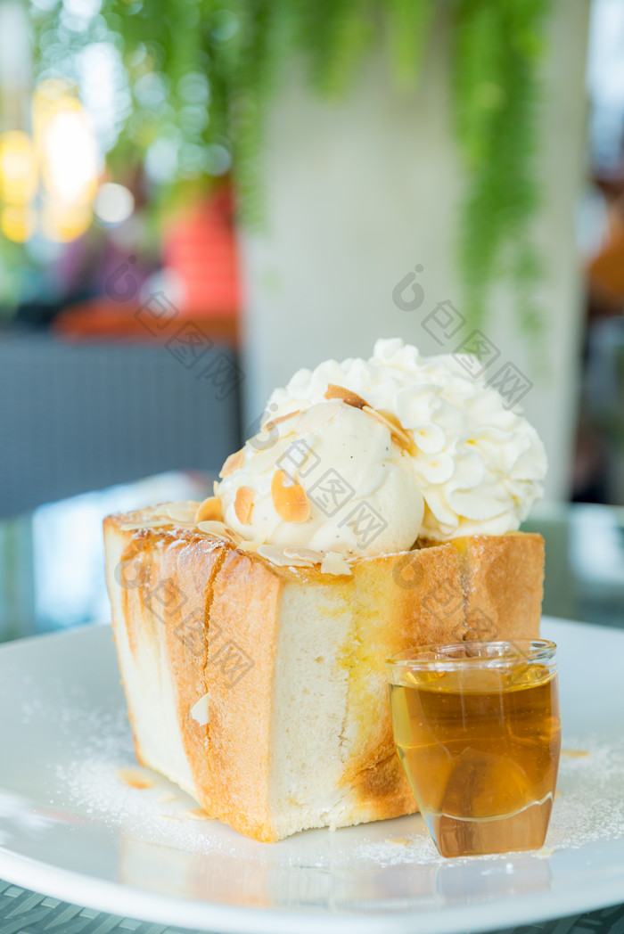 烤面包奶油蜂蜜摄影图