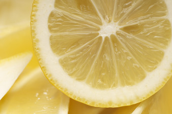 暖色调新鲜柠檬摄影图