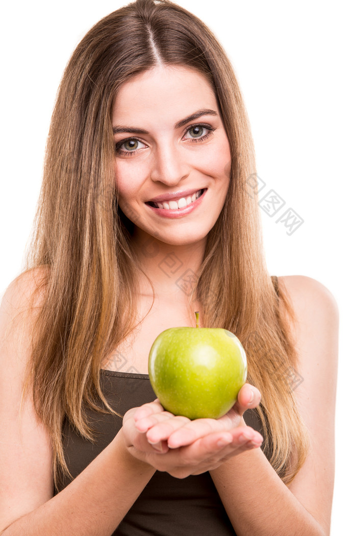 女人手中的青苹果