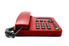 简约红色老式电话机摄影图