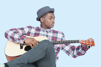 非洲男孩弹吉他背景