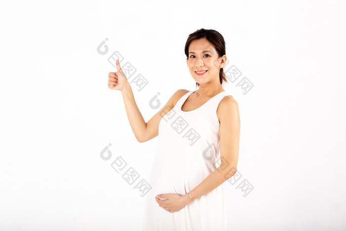 托着孕肚的孕妇摄影图