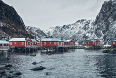 努斯峡湾挪威钓鱼冬季雪景摄影图