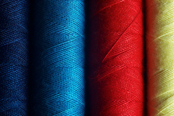 彩色的丝线缝衣服用的线摄影图片