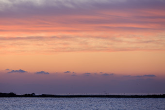 夕阳落日孤岛海堤