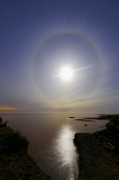 海岸太阳光晕风景摄影插图