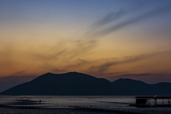 海边海岛晚霞天空摄影图