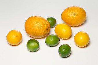 橙子柠檬和青柠摄影图