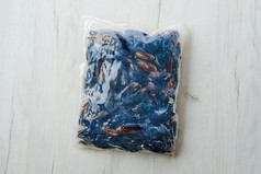 塑料袋里的牡蛎摄影图