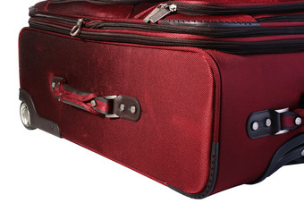 红色旅行行李箱摄影