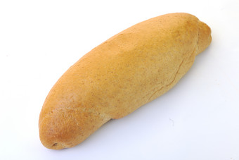 白色桌面上的黄色面包