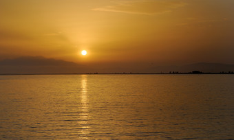 夕阳海水景色摄影图