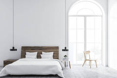 北欧风格的卧室的前景色, 白色的墙壁, 瓷砖地板, 衣架, 和床头桌的主床。3d 渲染模拟