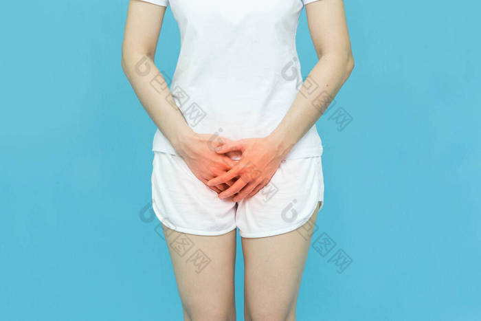 woman in white clothes put her hands on the genitalia area,hand on spot of ache and red mark, Penis 