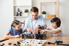 Pleasant  father playing with kids