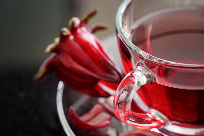 Closeup view of cup of hibiscus tea (rosella, karkade)