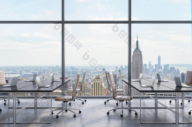 Workplaces in a modern panoramic office, New York city view from the windows. Open space. Black tabl