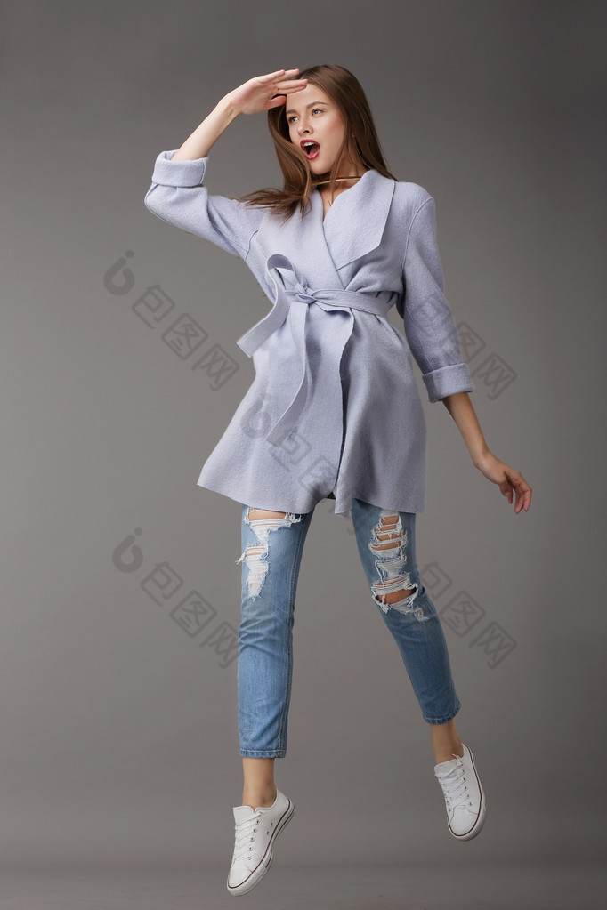 Emotional Young Woman in Outer Garments