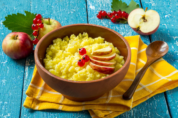 Useful millet porridge with apple and red currant 