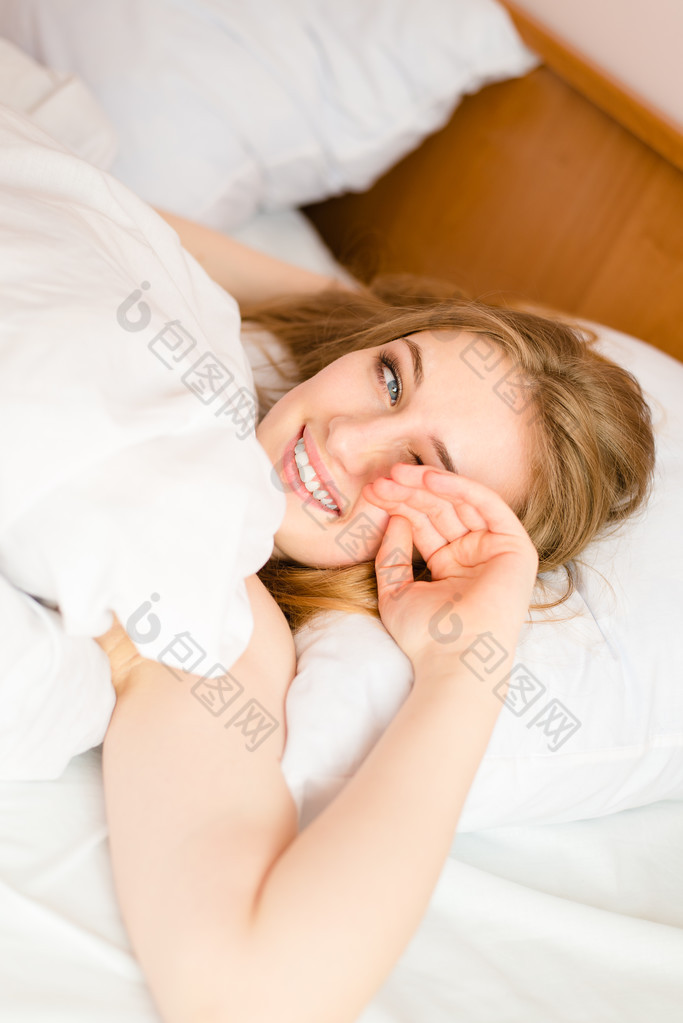 Young lady trying to wake up