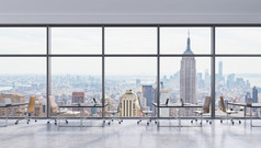 Workplaces in a modern panoramic office, New York city view in the windows, Manhattan. Open space. B