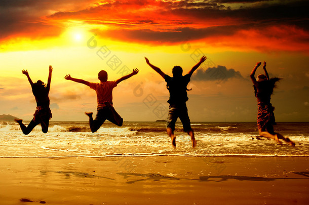 Young people silhouette in the beach