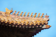 Ornate roof figurines at the Forbidden City, Beijing, China