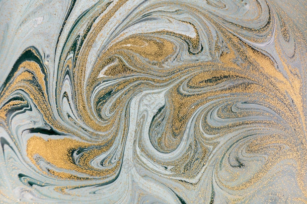 大理石抽象丙烯酸背景。自然绿色大理石艺术品纹理。金色闪光.