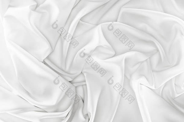 以白色软丝绸面料为背景的特写