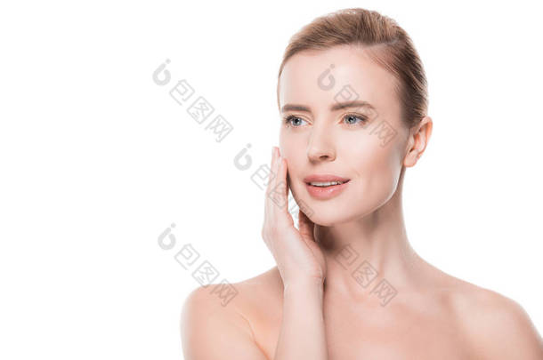 清洁新鲜皮肤的妇女触摸自己的脸上孤立的白色
