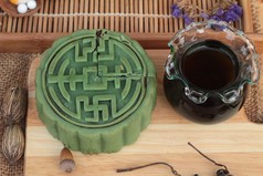 节日月亮蛋糕-中国点心、 绿茶.