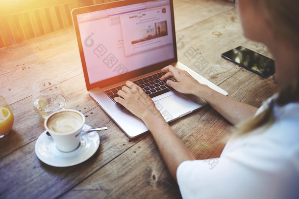 Young woman working on net-book