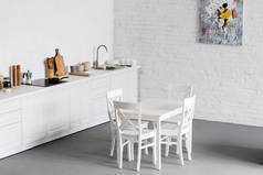 现代厨房白砖墙白色餐桌