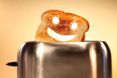 烤面包，烤面包机柜台上笑脸