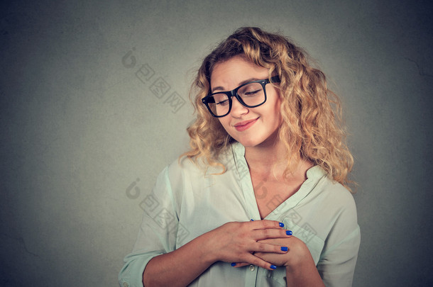 Lack of confidence. Shy young woman feels awkward 