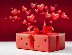 情人节礼物：送给红盒子里的爱人的礼物。有爱心的贺卡.