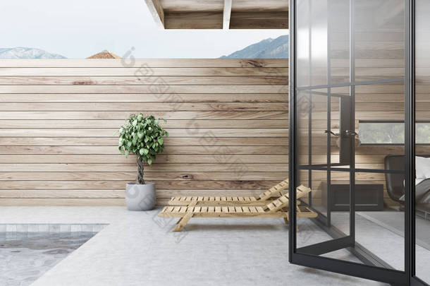 两个甲板椅站在私人泳池的豪华别墅与木墙附近。奢华的生活方式理念。3d 渲染