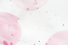 抽象的背景与浅粉色水彩画和飞溅