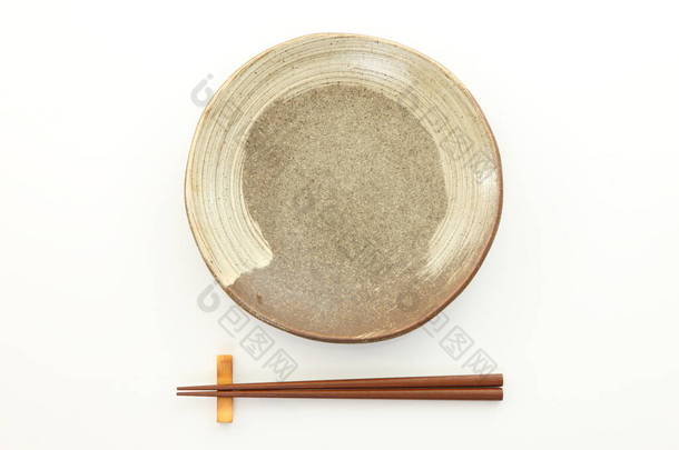 用<strong>筷子</strong>的空盘子