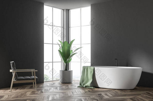 白色浴缸与绿色毛巾挂在它站在一个现代化的浴室角落, 黑色的墙壁和扶手椅。3d 渲染模拟
