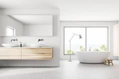 白色和木墙全景浴室内饰与热带景观。一个优雅的白色浴缸站在窗口附近。它旁边有一个双水槽。3d 渲染模拟
