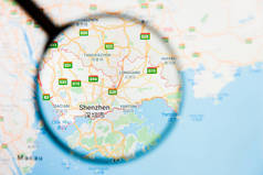 中国深圳城市可视化展示概念在显示屏上的放大镜