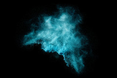 孤立在黑色的蓝色粉尘粒子爆炸