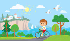 男孩骑自行车。夏天的冥想背景。海滨景观.
