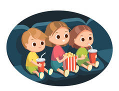 孩子们凝视着,凝视着银幕,惊讶地看着惊心动魄的电影.电影院里的爆米花小孩看电影和吃爆米花的小孩。与朋友共度时光.
