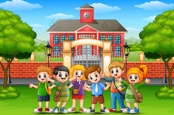 快乐的学校孩子们站在学校大楼前