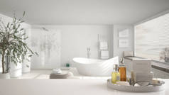 Spa, 酒店卫生间的概念。白色桌顶或货架与沐浴配件, 洗浴用品, 超模糊的大简约卫浴, 现代建筑室内设计