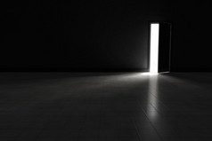 明亮的灯光照耀在昏暗的房间里打开大门。背景