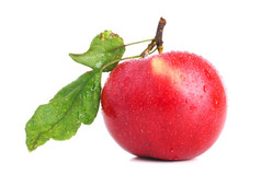 红苹果与上白色的叶子